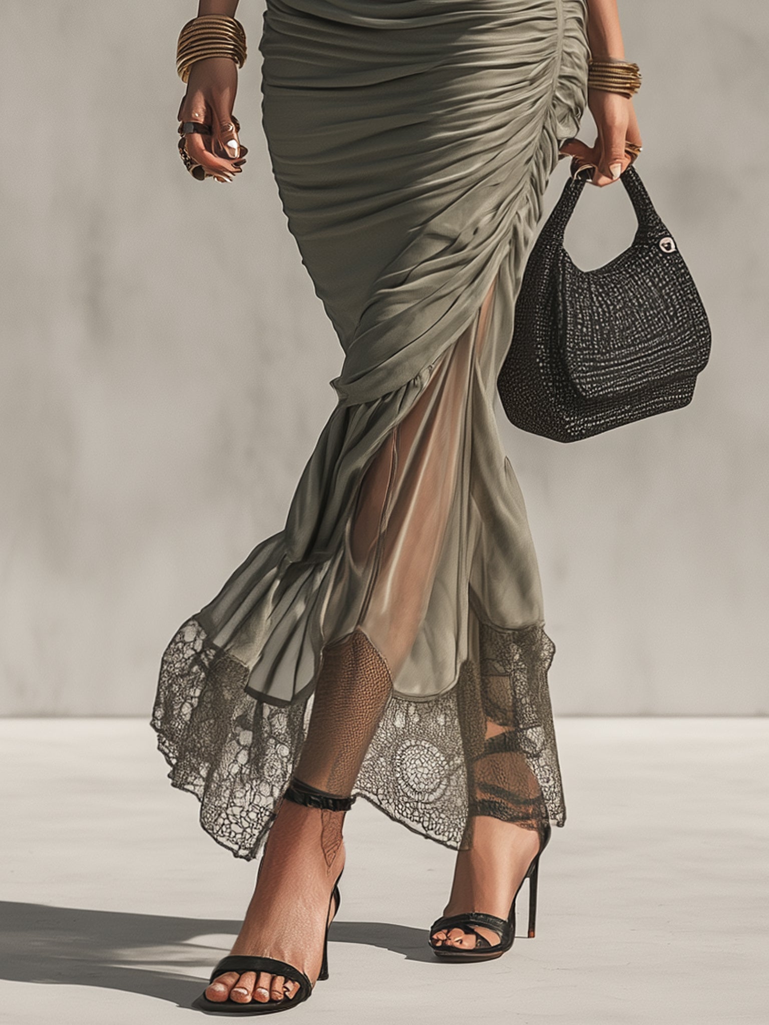 Grey irregularly shaped pleated dress with a slanted collar