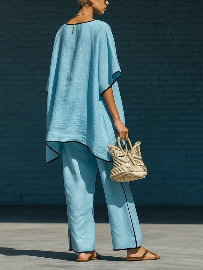 Minimalist blue irregular-hem top and wide-leg trousers set