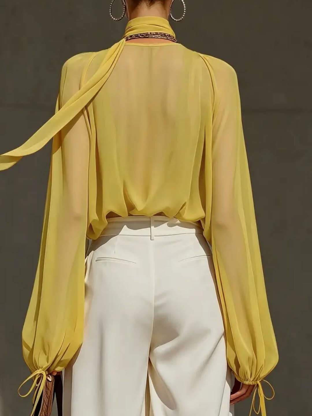 Yellow V-neck chiffon top and white trousers set